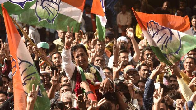 Congress candidate Imran Yusufbhai Khedawala shows victory sign in Ahmedabad on Monday. (Satish Bate/HT Photo) Congress candidate Imran Yusufbhai Khedawala shows victory sign in Ahmedabad on Monday. (Satish Bate/HT Photo)