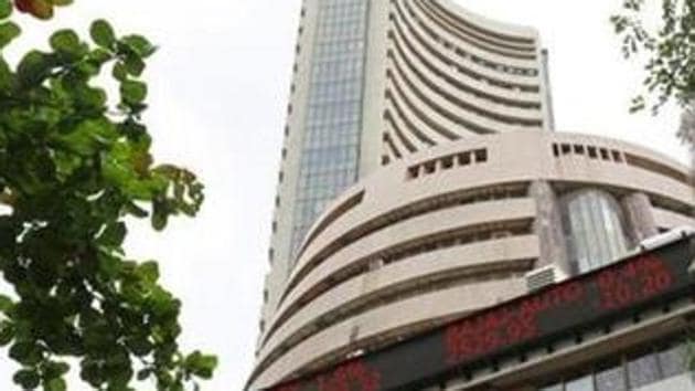 A screen across a road displaying the Sensex on the facade of the Bombay Stock Exchange building in Mumbai.(File)