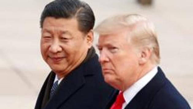 File photo of US President Donald Trump taking part in a welcoming ceremony with China's President Xi Jinping in Beijing on November 9, 2017.(Reuters) File photo of US President Donald Trump taking part in a welcoming ceremony with China's President Xi Jinping in Beijing on November 9, 2017.(Reuters)