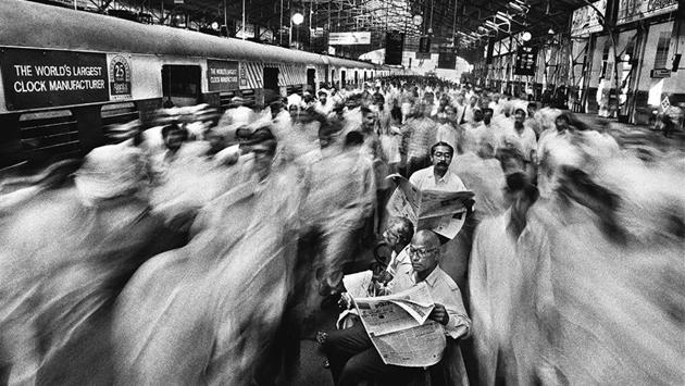 Commuters at Churchgate Railway Station, Mumbai 1996. Interestingly, nothing seems to have changed even in 2017 as local trains still carry the weight of the city’s commuter traffic. (Raghu Rai / Magnum Photos) Commuters at Churchgate Railway Station, Mumbai 1996. Interestingly, nothing seems to have changed even in 2017 as local trains still carry the weight of the city’s commuter traffic. (Raghu Rai / Magnum Photos)