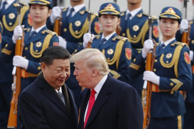 US President Donald Trump, right, chats with Chinese President Xi Jinping during a welcome ceremony at the Great Hall of the People in Beijing. (AP File Photo) US President Donald Trump, right, chats with Chinese President Xi Jinping during a welcome ceremony at the Great Hall of the People in Beijing. (AP File Photo)