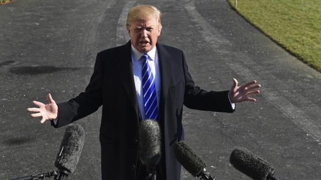 FILE - In this Dec. 16, 2017, file photo, President Donald Trump talks with reporters as he departs from the South Lawn of the White House via Marine One in Washington, to spend the weekend at Camp David in Maryland. (AP) FILE - In this Dec. 16, 2017, file photo, President Donald Trump talks with reporters as he departs from the South Lawn of the White House via Marine One in Washington, to spend the weekend at Camp David in Maryland. (AP)