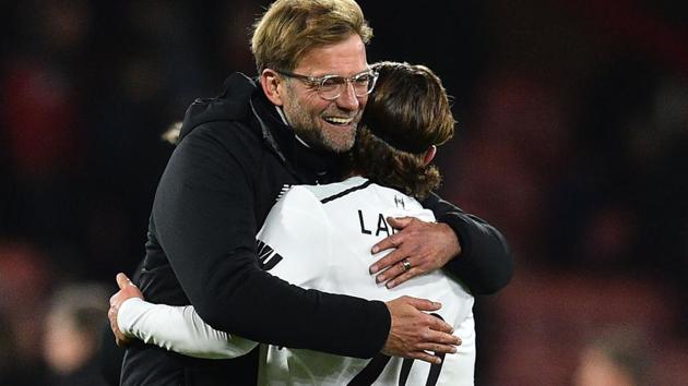 Liverpool FC manager Jurgen Klopp (L) celebrates with midfielder Adam Lallana after the English Premier League match against Bournemouth on Sunday. (AFP) Liverpool FC manager Jurgen Klopp (L) celebrates with midfielder Adam Lallana after the English Premier League match against Bournemouth on Sunday. (AFP)