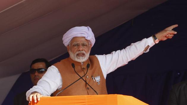 Prime Minister Narendra Modi speaks during an election campaign rally at Jasdan in Gujarat.(AP)