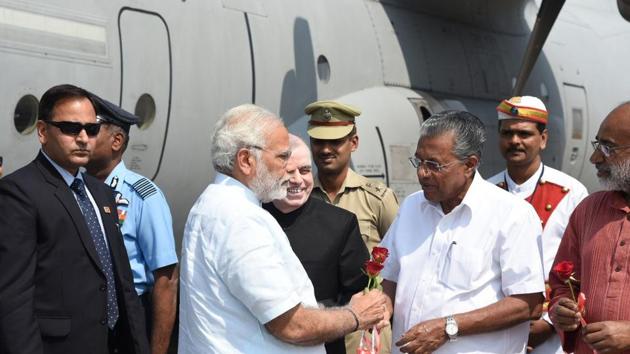 Kerala chief minister Pinarayi Vijayan receives PM Narendra Modi, who visited the southern state Tuesday to take stock of the damage caused by Cyclone Ockhi. (Photo tweeted by: @PIB_India) Kerala chief minister Pinarayi Vijayan receives PM Narendra Modi, who visited the southern state Tuesday to take stock of the damage caused by Cyclone Ockhi. (Photo tweeted by: @PIB_India)