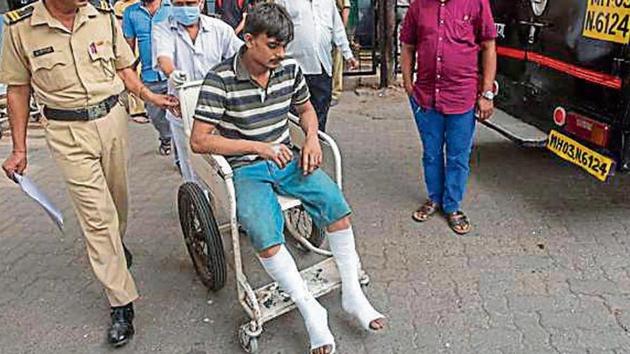 One of the survivors, Akhilesh Tiwari, 20, jumped out of a window 20 feet above the ground, fracturing both legs. (PRATIK CHORGE/HT) One of the survivors, Akhilesh Tiwari, 20, jumped out of a window 20 feet above the ground, fracturing both legs. (PRATIK CHORGE/HT)