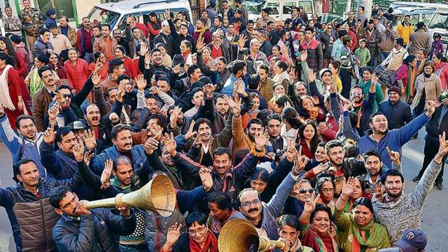 BJP supporters exuberant after the party’s victory in the Himachal Pradesh Assembly elections in Shimla on Monday. (PTI) BJP supporters exuberant after the party’s victory in the Himachal Pradesh Assembly elections in Shimla on Monday. (PTI)