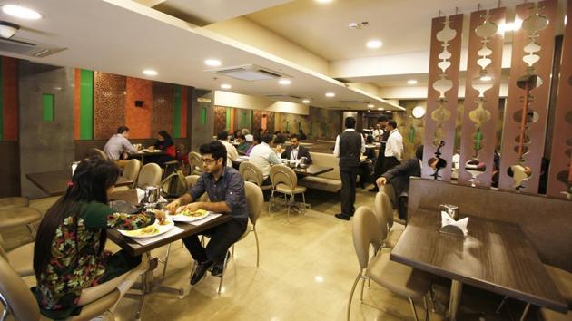 According to a notification, all establishments but bars, liquor shops and restaurants serving alcohol to remain open around the clock. (HT) According to a notification, all establishments but bars, liquor shops and restaurants serving alcohol to remain open around the clock. (HT)