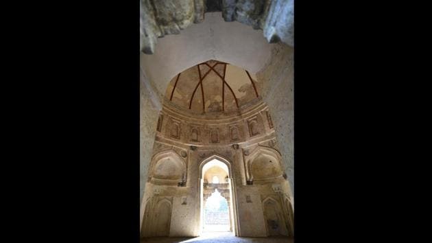 Incised plaster work on the dome of Bara Lao ka Gumbad peeks through an archway leading inside. If all goes to plan, Managing Director of Delhi Tourism and Transport Development Corporation, Shurbir Singh said a detailed plan once ready, will be sent to the government for approval. These and other monuments will be included to give tourists a wholesome experience of Delhi’s history. (Sanchit Khanna / HT Photo) Incised plaster work on the dome of Bara Lao ka Gumbad peeks through an archway leading inside. If all goes to plan, Managing Director of Delhi Tourism and Transport Development Corporation, Shurbir Singh said a detailed plan once ready, will be sent to the government for approval. These and other monuments will be included to give tourists a wholesome experience of Delhi’s history. (Sanchit Khanna / HT Photo)