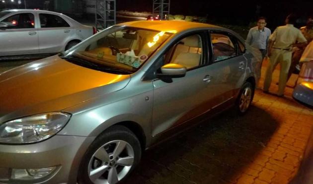 The police have got CCTV images from the restaurant that shows two men smashing the car window (in pic) and escaping with two bags on a motorcycle with no number plates. The police have got CCTV images from the restaurant that shows two men smashing the car window (in pic) and escaping with two bags on a motorcycle with no number plates.