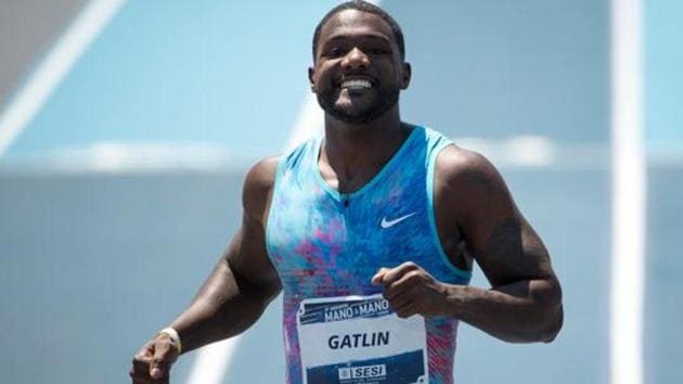 Justin Gatlin has sacked his coach Dennis Mitchell after allegations that Mitchell and an athletics agent offered to sell performance-enhancing drugs to reporters(AFP)