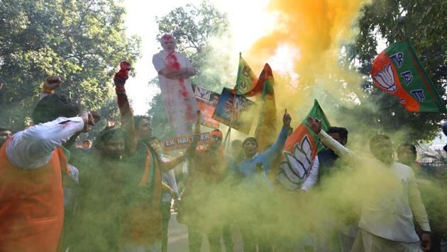 BJP worker and supporters celebrate after winning assembly elections in Gujarat and Himachal Pradesh at BJP headquarters in New Delhi on December 18. (Sonu Mehta/HT File Photo) BJP worker and supporters celebrate after winning assembly elections in Gujarat and Himachal Pradesh at BJP headquarters in New Delhi on December 18. (Sonu Mehta/HT File Photo)