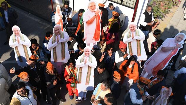 BJP workers celebrate at BJP headquarters in New Delhi on December 18. (Sonu Mehta/HT PHOTO) BJP workers celebrate at BJP headquarters in New Delhi on December 18. (Sonu Mehta/HT PHOTO)
