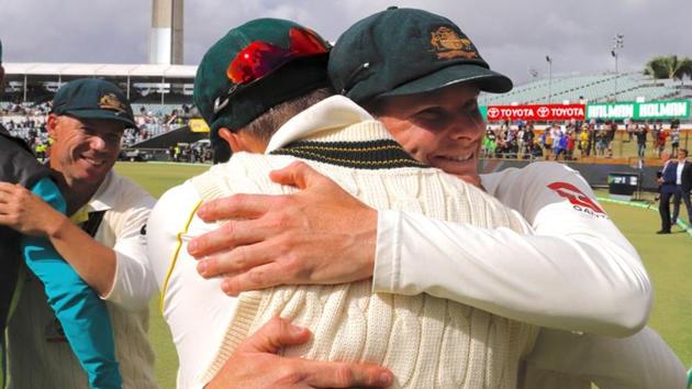 Australia cricket team captain Steve Smith hugs teammates after winning the third Ashes Test against England cricket team in Perth on Monday. (REUTERS) Australia cricket team captain Steve Smith hugs teammates after winning the third Ashes Test against England cricket team in Perth on Monday. (REUTERS)