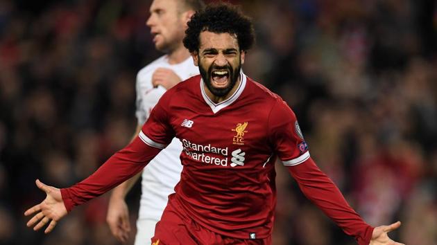 (FILE PIC) Liverpool FC's Egyptian midfielder Mohamed Salah celebrates scoring their seventh goal during the UEFA Champions League Group E football match against Spartak Moscow at Anfield. (AFP) (FILE PIC) Liverpool FC's Egyptian midfielder Mohamed Salah celebrates scoring their seventh goal during the UEFA Champions League Group E football match against Spartak Moscow at Anfield. (AFP)
