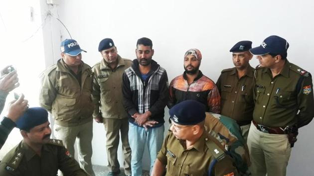 Haridwar police arrested two contract killers, who were out to shoot down a Dehradun-based property dealer, from an overbridge near Roorkee on Tuesday.(HT Photo)