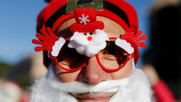 The jury’s out on these glasses but here’s St. Nick during a Santa Claus meet at the Colosseum in Rome. (Tony Gentile / REUTERS)