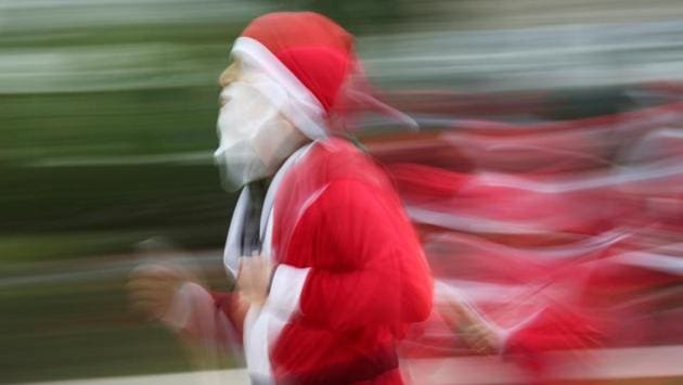 Santa moves at light speed channelling his inner Forrest Gump at the annual “Run Santa Run” race in Monterey, Mexico. (Daniel Becerril / REUTERS)