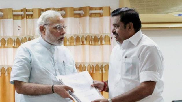 Prime Minister Narendra Modi receives a memorandam from Tamil Nadu chief minister Edappadi K Palaniswami during his visit to the Cyclone Ockhi- hit areas, in Kanyakumari on Tuesday. (PTI Photo) Prime Minister Narendra Modi receives a memorandam from Tamil Nadu chief minister Edappadi K Palaniswami during his visit to the Cyclone Ockhi- hit areas, in Kanyakumari on Tuesday. (PTI Photo)