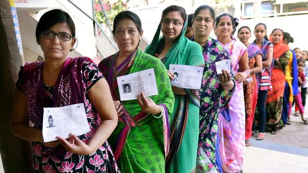 Women at a re-polling booth in Daskroi constituency, Ahmedabad, December 17 (PTI) Women at a re-polling booth in Daskroi constituency, Ahmedabad, December 17 (PTI)