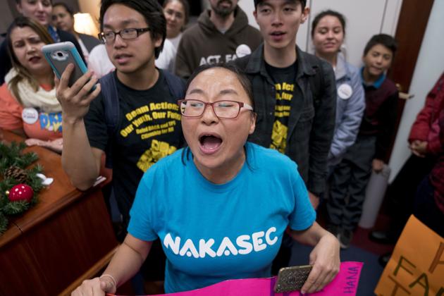 People protest in the offices of Senate Minority Leader Sen. Chuck Schumer, D-N Y, to demand that the Senate pass a clean DREAM Act, on Capitol Hill, Tuesday in Washington. (AP) People protest in the offices of Senate Minority Leader Sen. Chuck Schumer, D-N Y, to demand that the Senate pass a clean DREAM Act, on Capitol Hill, Tuesday in Washington. (AP)