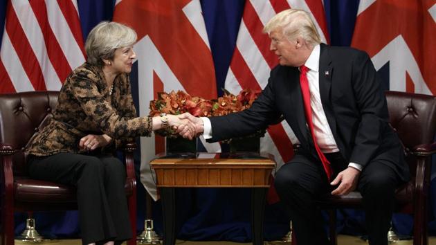 US President Donald Trump shakes hands with British Prime Minister Theresa May during their meeting at the Palace Hotel during the United Nations General Assembly in New York. (AP) US President Donald Trump shakes hands with British Prime Minister Theresa May during their meeting at the Palace Hotel during the United Nations General Assembly in New York. (AP)