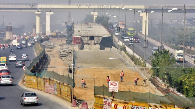 The 800-metre flyover was scheduled to open for traffic in September this year but it was delayed because the authorities could not get the forest department’s nod to remove trees on the stretch. (Sonu Mehta/HT PHOTO) The 800-metre flyover was scheduled to open for traffic in September this year but it was delayed because the authorities could not get the forest department’s nod to remove trees on the stretch. (Sonu Mehta/HT PHOTO)