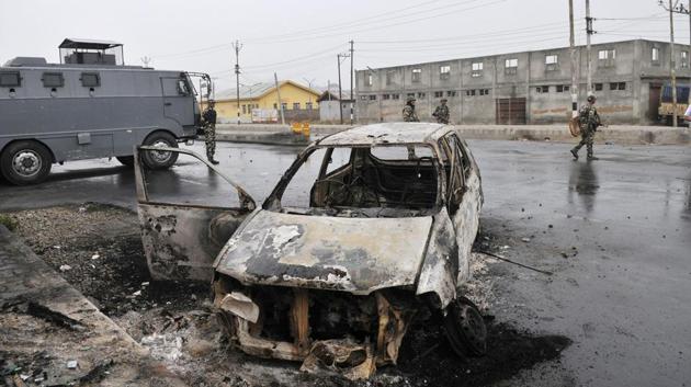 A charred car on the seventh day of the curfew imposed in Kashmir following the killing of Burhan Wani. More than half-a-million people gathered for the militant’s funeral, according to independent estimates. (Waseem Andrabi / HT Photo) A charred car on the seventh day of the curfew imposed in Kashmir following the killing of Burhan Wani. More than half-a-million people gathered for the militant’s funeral, according to independent estimates. (Waseem Andrabi / HT Photo)