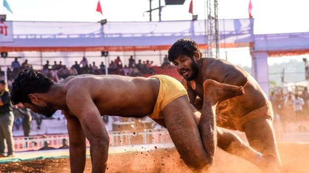 A wrestlers tries to break free from his opponent’s grip in order to deny him a point. (Sanket Wankhade/HT PHOTO) A wrestlers tries to break free from his opponent’s grip in order to deny him a point. (Sanket Wankhade/HT PHOTO)