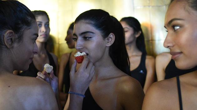 Models sharing light moments during the auditions in Mumbai. (Satyabrata Tripathy/HT Photo) 