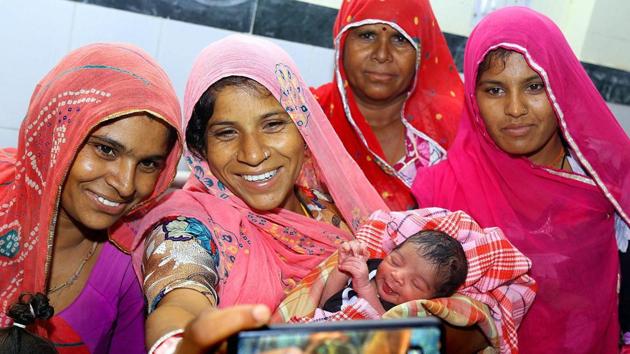 A mother takes selfies with her newborn child at Beawar in Rajasthan. Mother’s milk is the cheapest option to reduce infant mortality rate.(PTI) A mother takes selfies with her newborn child at Beawar in Rajasthan. Mother’s milk is the cheapest option to reduce infant mortality rate.(PTI)