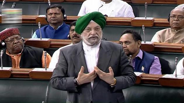Union minister of state (independent charge) for housing and urban affairs Hardeep Singh Puri speaks in the Lok Sabha in New Delhi, during the winter session of Parliament. (PTI Photo) Union minister of state (independent charge) for housing and urban affairs Hardeep Singh Puri speaks in the Lok Sabha in New Delhi, during the winter session of Parliament. (PTI Photo)