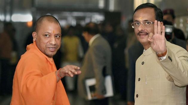 Uttar Pradesh CM Yogi Adityanath (left) and Deputy CM Dinesh Sharma on their way to attend the winter session of UP Assembly, in Lucknow on Tuesday. (PTI) Uttar Pradesh CM Yogi Adityanath (left) and Deputy CM Dinesh Sharma on their way to attend the winter session of UP Assembly, in Lucknow on Tuesday. (PTI)