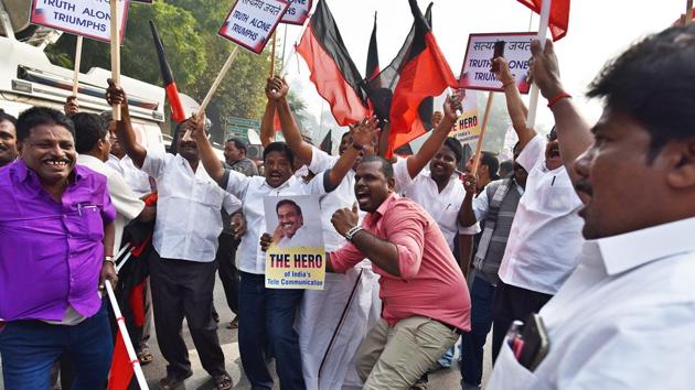 Supporters of DMK leader and former telecom minister A Raja celebrate in Delhi after a special court on December 21 acquitted him in the 2G spectrum case. (Sanchit Khanna/ HT Photo) Supporters of DMK leader and former telecom minister A Raja celebrate in Delhi after a special court on December 21 acquitted him in the 2G spectrum case. (Sanchit Khanna/ HT Photo)