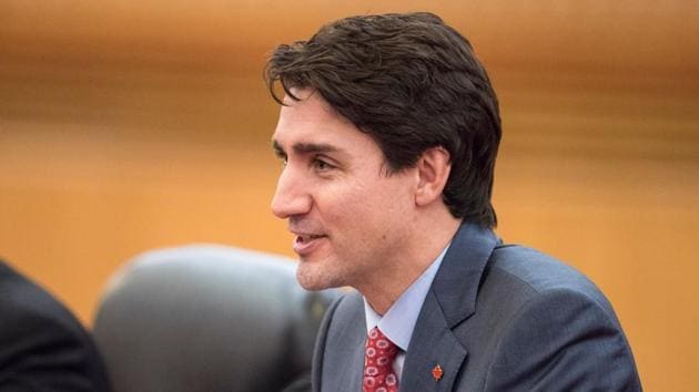 (FILES) This file photo taken on December 4, 2017 shows Canada's Prime Minister Justin Trudeau speaking to China's Premier Li Keqiang during a meeting at the Great Hall of the People in Beijing. (AFP) (FILES) This file photo taken on December 4, 2017 shows Canada's Prime Minister Justin Trudeau speaking to China's Premier Li Keqiang during a meeting at the Great Hall of the People in Beijing. (AFP)