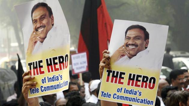 Former telecom minister A Raja's supporters celebrate his acquittal by a special court in the 2G scam case, in New Delhi. (PTI Photo) Former telecom minister A Raja's supporters celebrate his acquittal by a special court in the 2G scam case, in New Delhi. (PTI Photo)