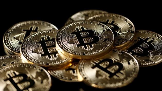 A collection of Bitcoin (virtual currency) tokens are displayed in this picture illustration taken December 8. (Reuters) A collection of Bitcoin (virtual currency) tokens are displayed in this picture illustration taken December 8. (Reuters)