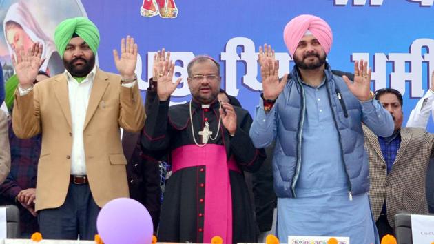 Punjab local bodies minister Navjot Singh Sidhu (R), Bhisop Franco Mulakkal (C) and member of Parliament Gurjeet Singh Aujla (L) during state level function held to mark Christmas Day in Amritsar on Thursday. (Sameer Sehgal) Punjab local bodies minister Navjot Singh Sidhu (R), Bhisop Franco Mulakkal (C) and member of Parliament Gurjeet Singh Aujla (L) during state level function held to mark Christmas Day in Amritsar on Thursday. (Sameer Sehgal)