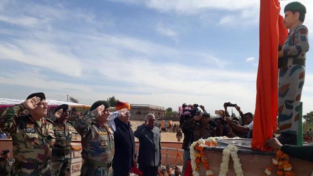 Army chief Gen Bipin Rawat unveils the memorial of martyr Dharma Ram at his village in Rajasthan.(HT Photo) Army chief Gen Bipin Rawat unveils the memorial of martyr Dharma Ram at his village in Rajasthan.(HT Photo)