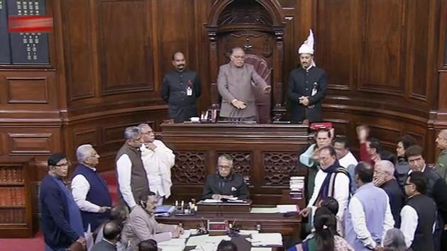 Opposition members protest in the well of the Rajya Sabha in New Delhi on Wednesday, during the ongoing winter session of Parliament. (PTI Photo) Opposition members protest in the well of the Rajya Sabha in New Delhi on Wednesday, during the ongoing winter session of Parliament. (PTI Photo)
