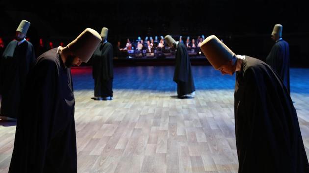 Dervishes ahead of a ‘Sema’ ritual during a ceremony marking the 744th anniversary Rumi’s death in Konya. Every December, the city organises 10 days of celebrations to commemorate the December 17, 1273 event. It was his followers who founded the brotherhood of whirling dervishes, so-called for the trance-like dance which is distinguishes their worship. (Adem Altan / AFP) Dervishes ahead of a ‘Sema’ ritual during a ceremony marking the 744th anniversary Rumi’s death in Konya. Every December, the city organises 10 days of celebrations to commemorate the December 17, 1273 event. It was his followers who founded the brotherhood of whirling dervishes, so-called for the trance-like dance which is distinguishes their worship. (Adem Altan / AFP)