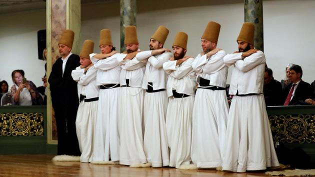 Dervishes prepare for the Sema ritual at the Mevlana museum in Konya -- which houses Rumi’s tomb -- the most visited museum in Turkey with 2.43 million visitors. During the celebrations between December 7 and 17, nearly 65,000 people came to watch the dervishes in trance. (Murad Sezer / REUTERS) Dervishes prepare for the Sema ritual at the Mevlana museum in Konya -- which houses Rumi’s tomb -- the most visited museum in Turkey with 2.43 million visitors. During the celebrations between December 7 and 17, nearly 65,000 people came to watch the dervishes in trance. (Murad Sezer / REUTERS)