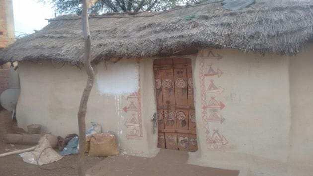 A tribal home at village Vinega in Shivpuri district where a message ‘Mera parivar gareeb hai’ was written about a couple of months back. The message was removed after a law student’s complaint to NHRC and a Hindustan Times report on this. (HT photo) A tribal home at village Vinega in Shivpuri district where a message ‘Mera parivar gareeb hai’ was written about a couple of months back. The message was removed after a law student’s complaint to NHRC and a Hindustan Times report on this. (HT photo)