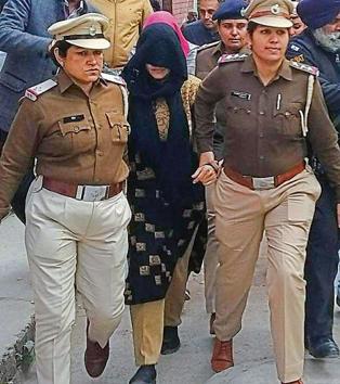 Honeypreet, the adopted daughter of the dera head, being taken to court in Panchkula Panchkula on Thursday. (Sant Arora /HT) Honeypreet, the adopted daughter of the dera head, being taken to court in Panchkula Panchkula on Thursday. (Sant Arora /HT)