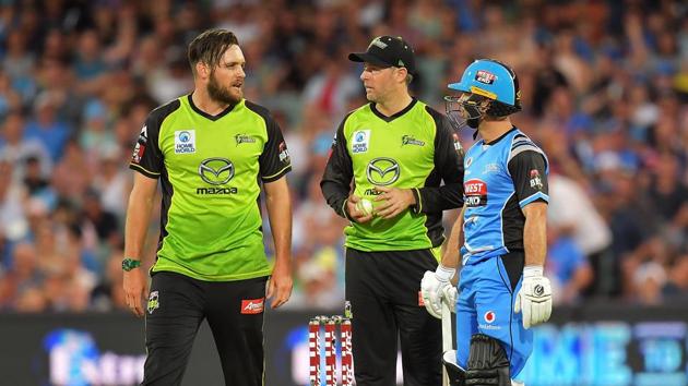 Mitchell McClenaghan collided with the non-striker as he attempted a catch and instead appealed for an obstructing the field during the Big Bash League clash between Sydney Thunder and Adelaide Strikers.(Getty Images)