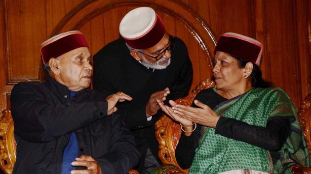 BJP central observer Nirmala Sitharaman talks with the former chief minister and senior leader Prem Kumar Dhumal during a meeting with the newly elected party MLAs in Shimla on Thursday.(PTI Photo)