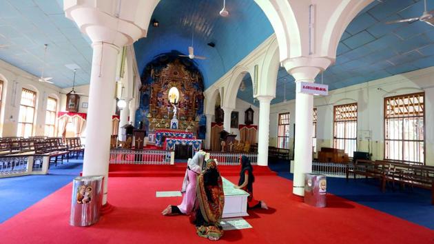 Women pray at the tomb of St. Kuriakose at Mannanam. India has only six Christian saints, and the last five have come in the past decade. The first saint was a Eurasian, Gonsalo Garcia in 1862, but the next saint took 146 years -- Alphonsa was canonised in 2008. In 2014, Kuriakose Elias Chavara and Euprasia were canonised. In 2016, Mother Teresa was declared a saint. (Vivek Nair / HT Photo) 