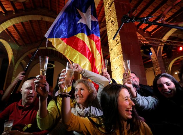 People react to results in Catalonia's regional elections at a gathering of the Catalan National Assembly (ANC) in Barcelona, Spain December 21. (Reuters) People react to results in Catalonia's regional elections at a gathering of the Catalan National Assembly (ANC) in Barcelona, Spain December 21. (Reuters)