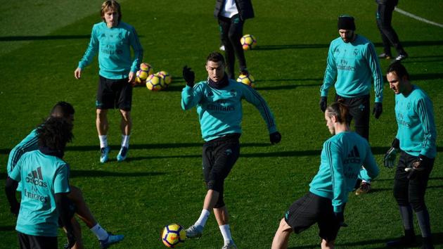 Real Madrid's Portuguese forward Cristiano Ronaldo during a training session at Valdebebas Sport City in Madrid on December 22, 2017 on the eve of their La Liga football match against FC Barcelona. (AFP) Real Madrid's Portuguese forward Cristiano Ronaldo during a training session at Valdebebas Sport City in Madrid on December 22, 2017 on the eve of their La Liga football match against FC Barcelona. (AFP)