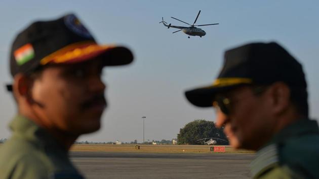 Indian Airforce (IAF) MI-8 Helicopter, also known as 'PRATAP' makes final flight during the phasing out ceremony held to bid adieu to the Russian made multi-role chopper at the Yelahanka Airforce Station in Bangalore on Sunday. (Manjunath Kiran / AFP)